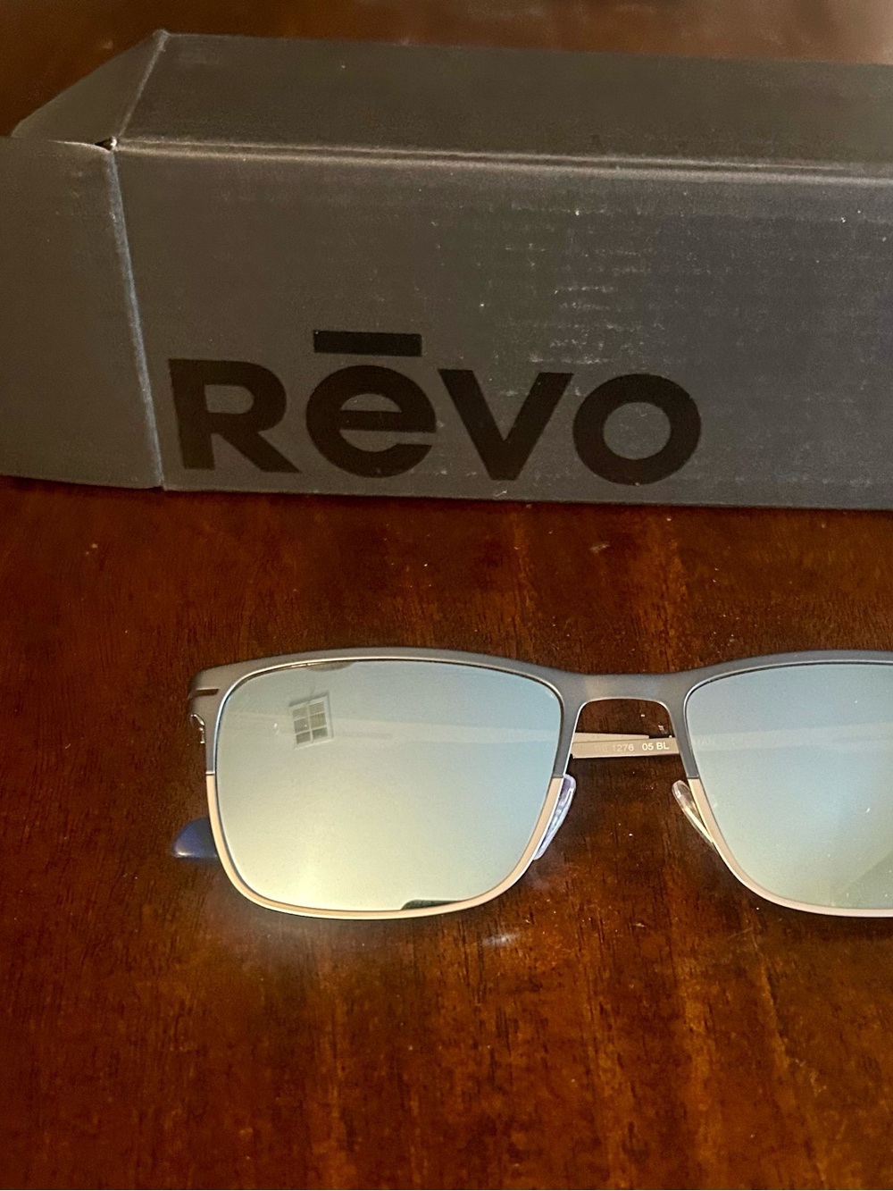 Revo Silver Frame Sunglasses with Blue Mirrored Lenses
